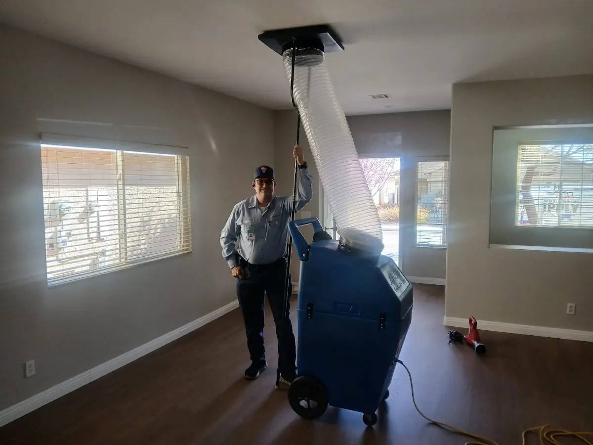Professional Dryer Vent Cleaning work inside a Oceanside home